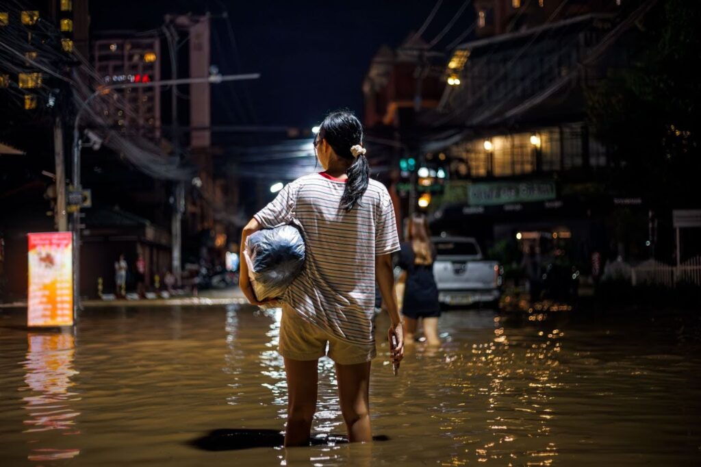 Flood Victim standing in knee-high water